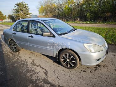 Mitsubishi Lancer Salon 1.3 SD MPI COM