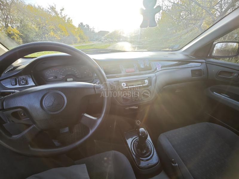 Mitsubishi Lancer Salon 1.3 SD MPI COM