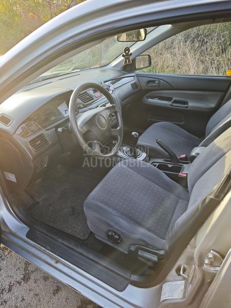 Mitsubishi Lancer Salon 1.3 SD MPI COM