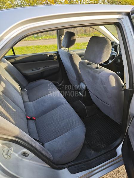 Mitsubishi Lancer Salon 1.3 SD MPI COM
