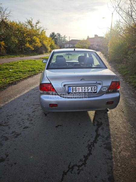 Mitsubishi Lancer Salon 1.3 SD MPI COM