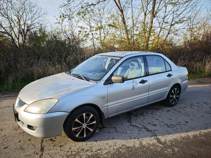 Mitsubishi Lancer Salon 1.3 SD MPI COM