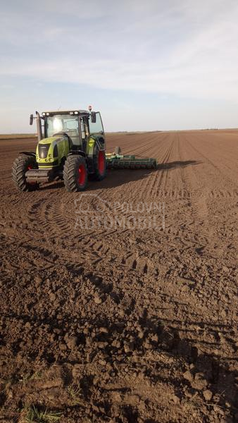 Claas Arion Ares 697