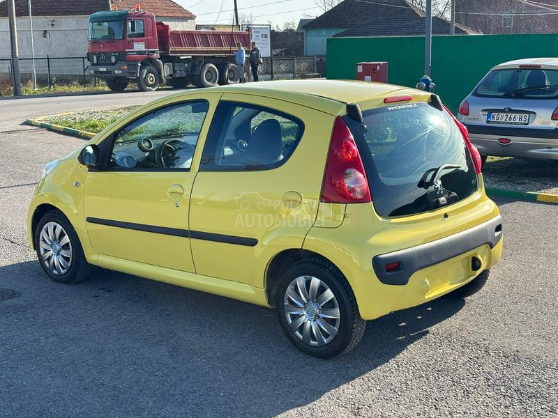 Peugeot 107 yellow nov