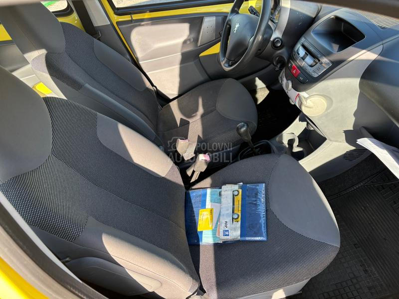 Peugeot 107 yellow nov