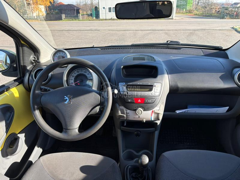 Peugeot 107 yellow nov