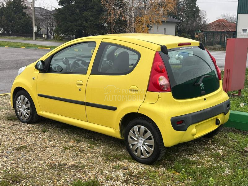 Peugeot 107 yellow nov