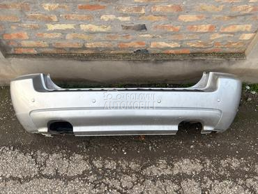 Branik zadnji i sina branika za Kia Sportage od 2004. do 2010. god.