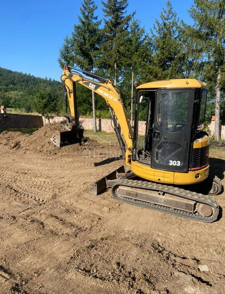 Mercedes Benz mini bager catepilar