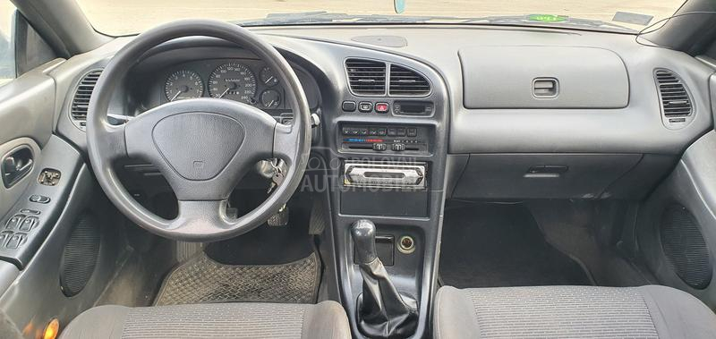 Mazda 323 O C U V A N A