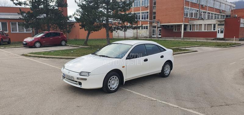 Mazda 323 O C U V A N A