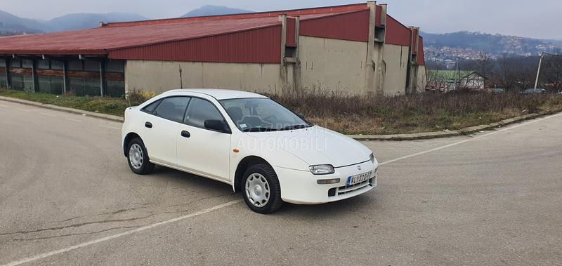 Mazda 323 O C U V A N A