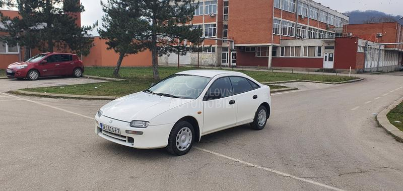 Mazda 323 O C U V A N A