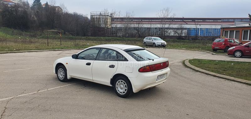 Mazda 323 O C U V A N A