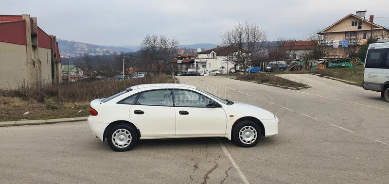 Mazda 323 O C U V A N A