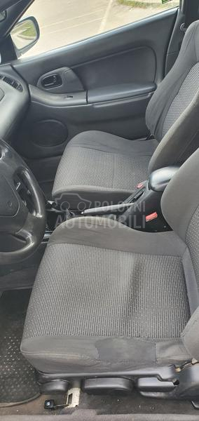 Mazda 323 O C U V A N A