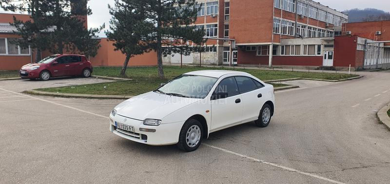 Mazda 323 O C U V A N A