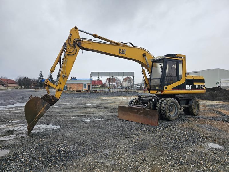 CAT M315