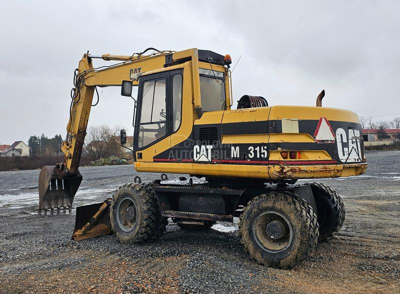 CAT M315