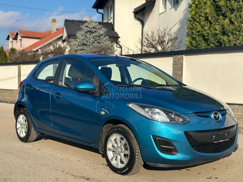 Mazda 2 1.3i Exclusive  CH