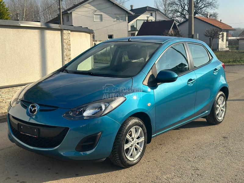 Mazda 2 1.3i Exclusive  CH