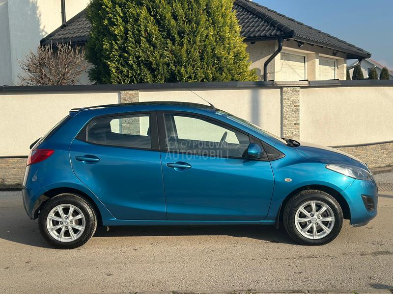 Mazda 2 1.3i Exclusive  CH