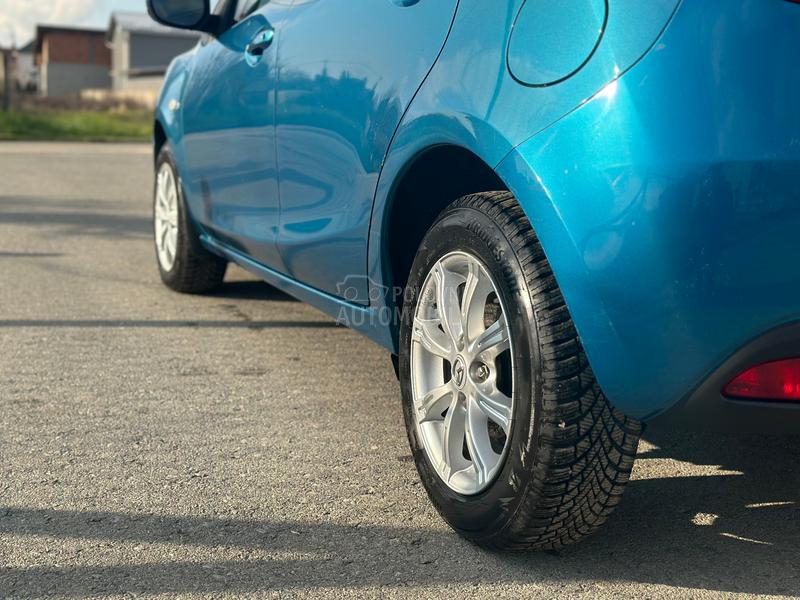 Mazda 2 1.3i Exclusive  CH