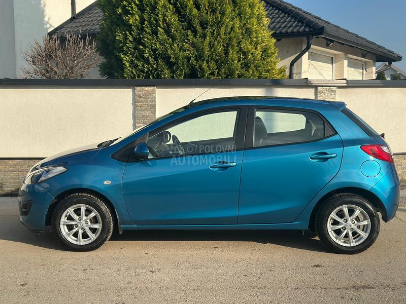 Mazda 2 1.3i Exclusive  CH