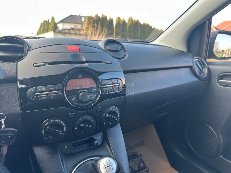 Mazda 2 1.3i Exclusive  CH