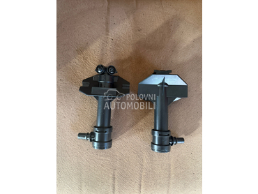 Leva prskalica fara za Audi Q3 od 2011. do 2014. god.