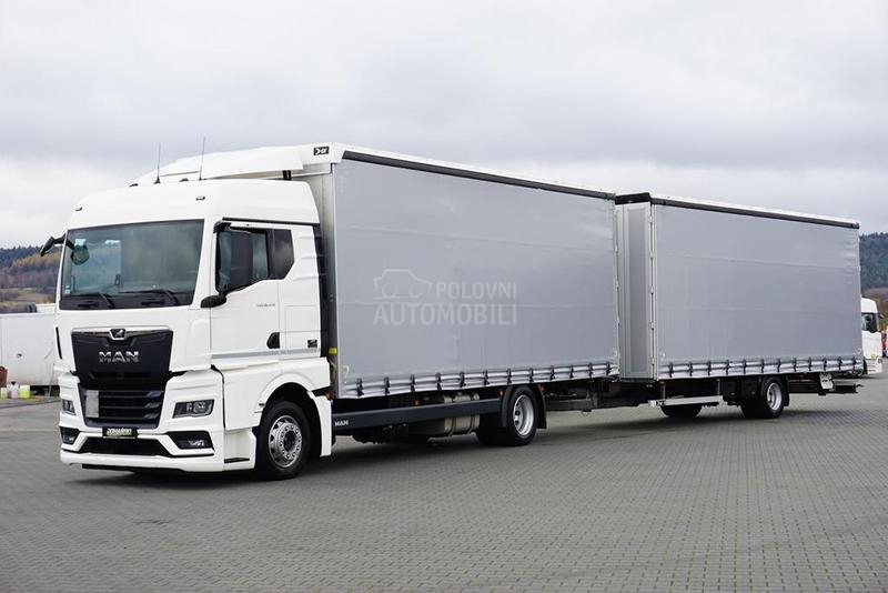 MAN TGX / prikolica DOM1701