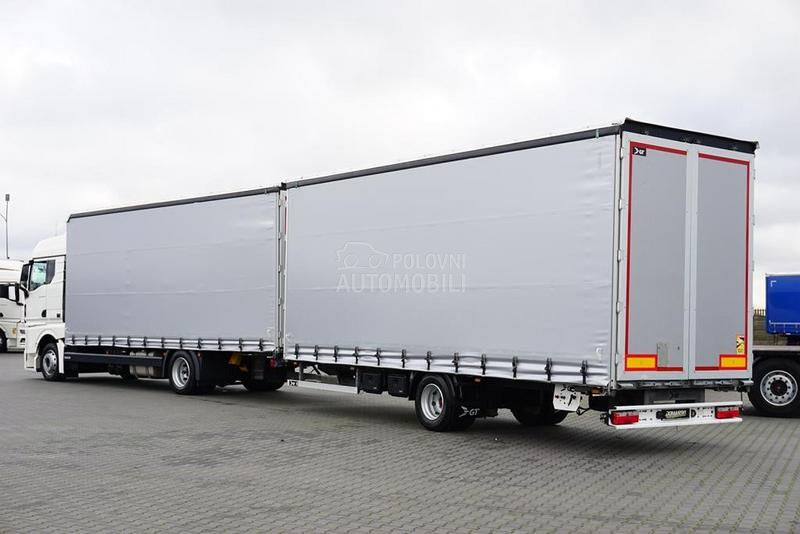 MAN TGX / prikolica DOM1701