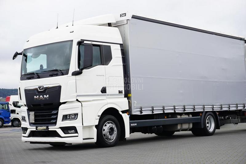 MAN TGX / prikolica DOM1701
