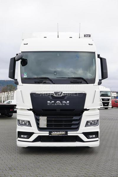 MAN TGX / prikolica DOM1701