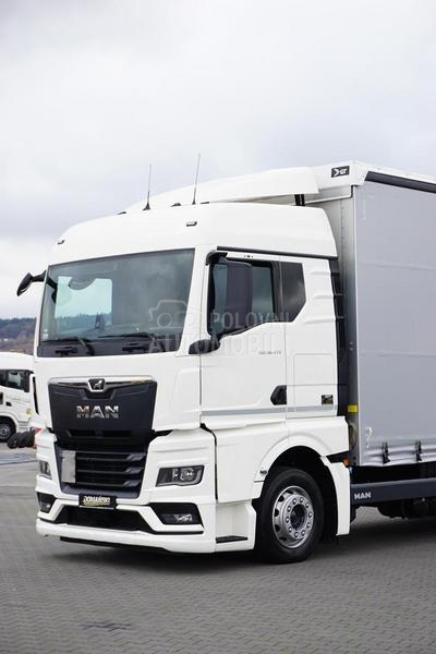 MAN TGX / prikolica DOM1701