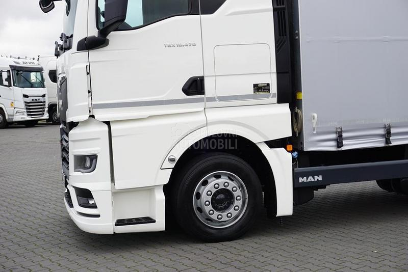 MAN TGX / prikolica DOM1701