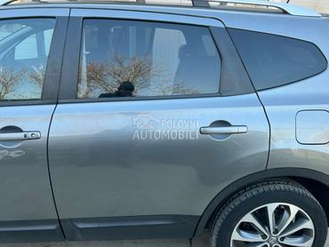 Vrata zadnja leva siva KADG za Nissan Qashqai + 2 od 2006. do 2013. god.