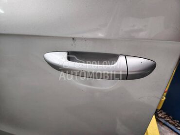 Kvaka spoljna zadnja leva za Volkswagen Passat B7