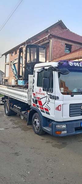 MAN tgl12. 240 i mini bager