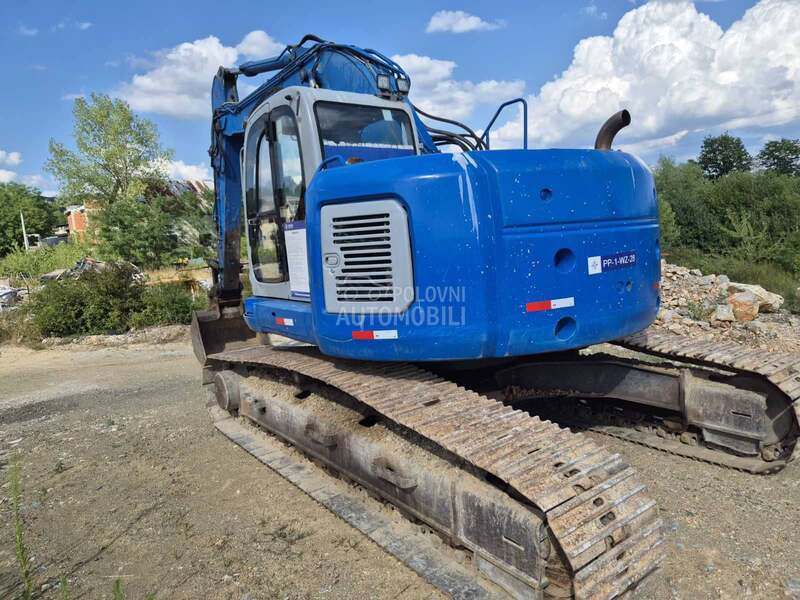 New Holland 325