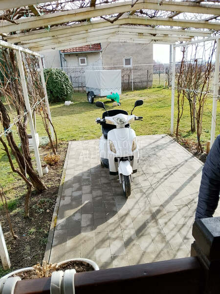 Access Motor Trocikl