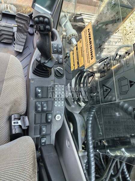 Volvo EC 140 DL ROTOTILT