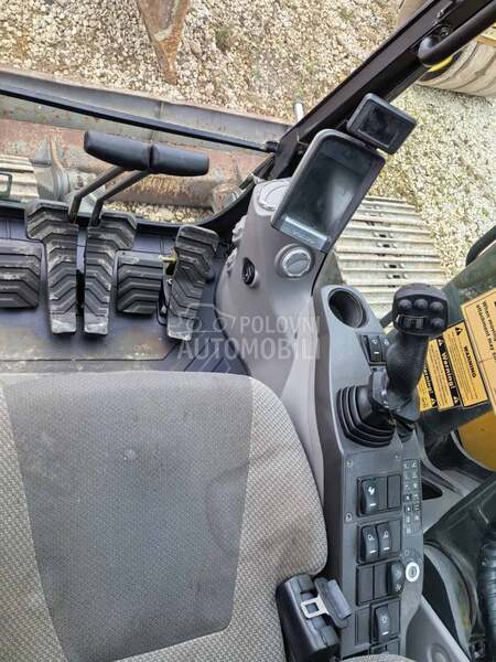 Volvo EC 140 DL ROTOTILT