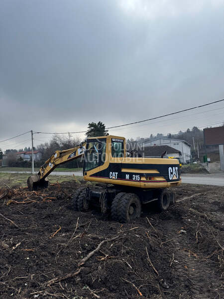 CAT M315