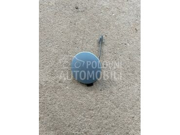 Poklopac kuke prednjeg branika za Volkswagen Polo od 2009. do 2014. god.