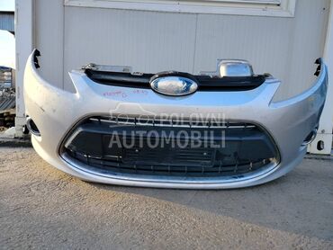 Prednji branik boja-siva za Ford Fiesta od 2008. do 2013. god.