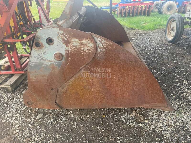 New Holland Kasika krokodilka