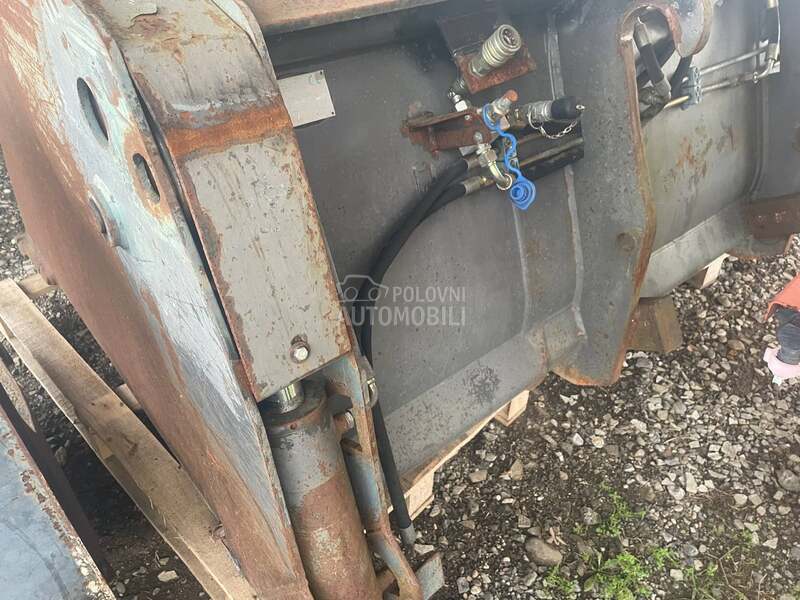 New Holland Kasika krokodilka