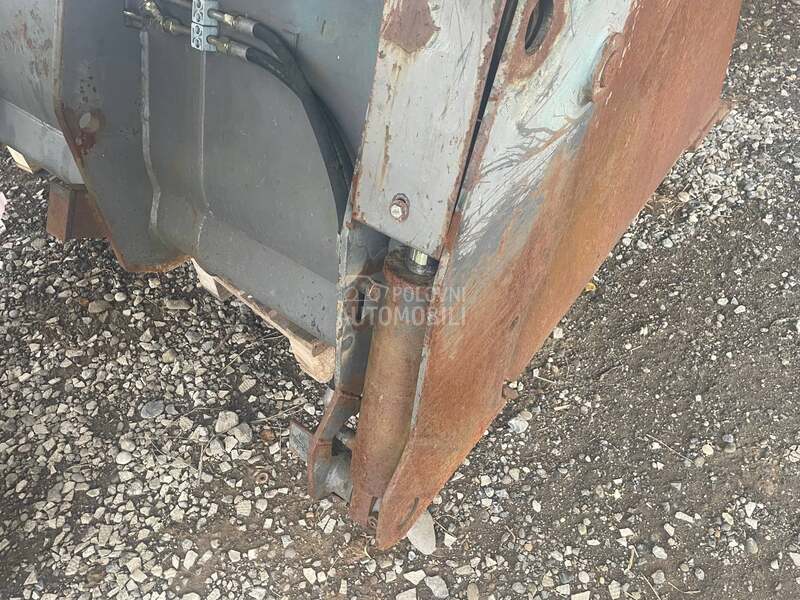 New Holland Kasika krokodilka