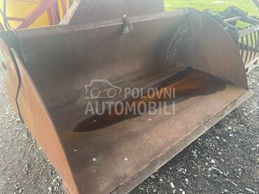 New Holland Kasika krokodilka